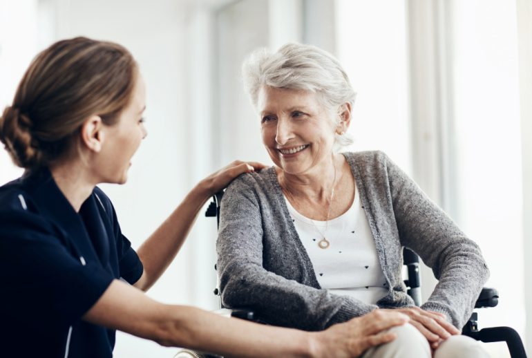 Healthcare professional with a female patient 