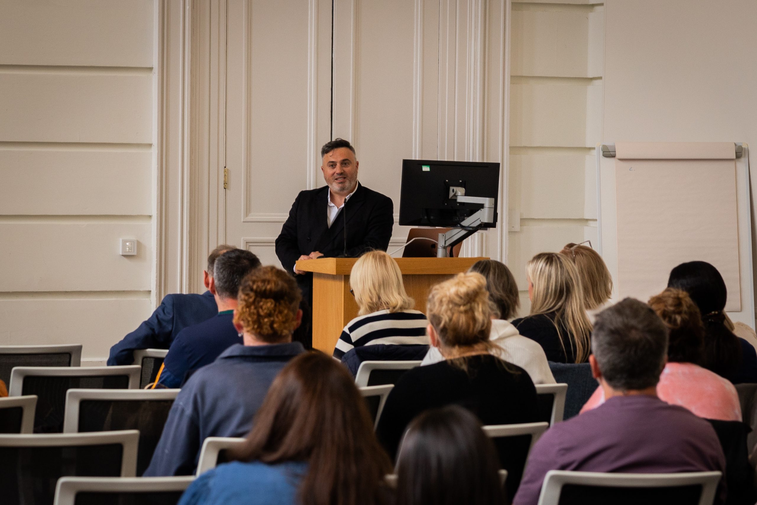 Lecturer addressing students