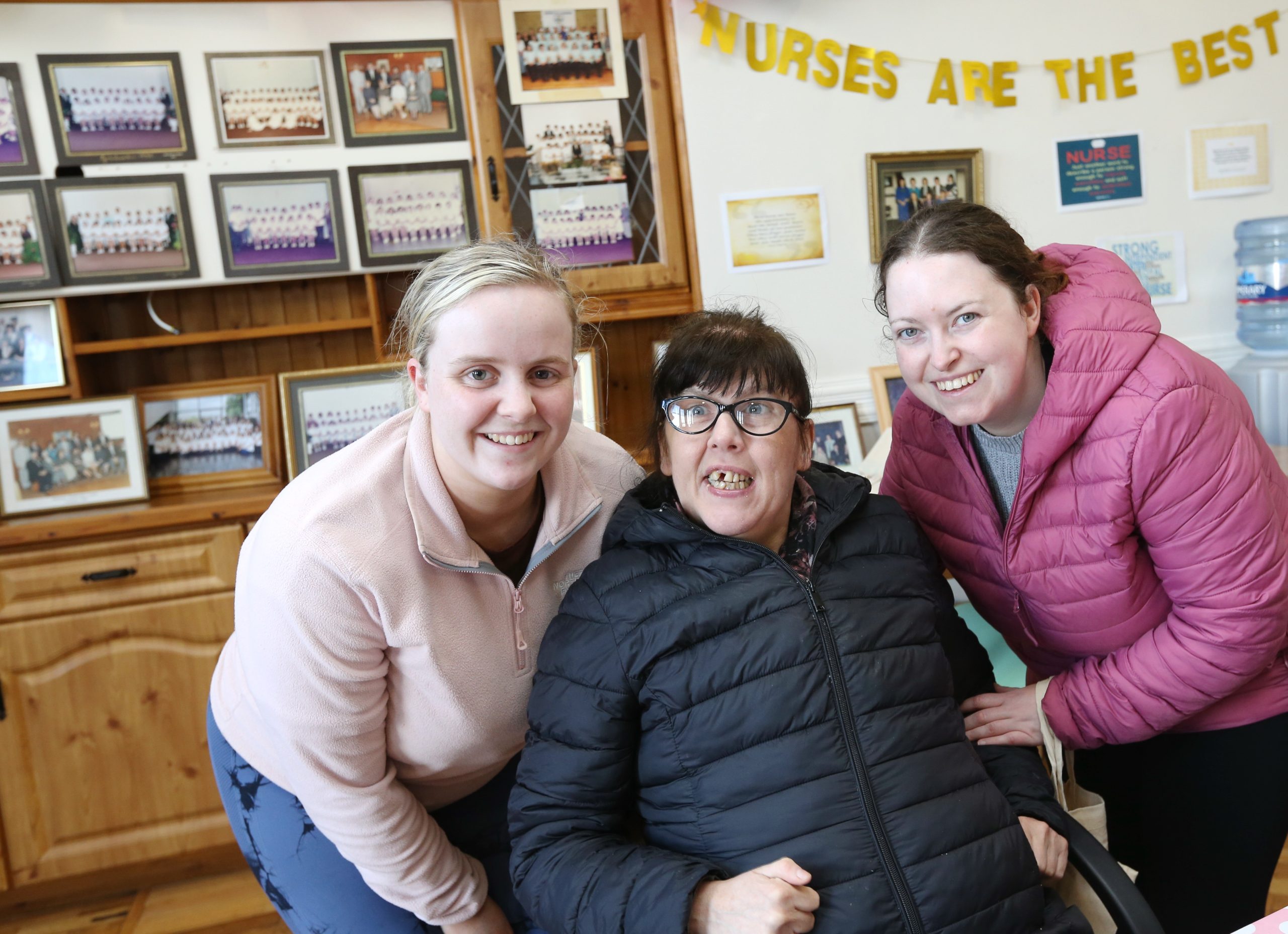 3 ladies smiling