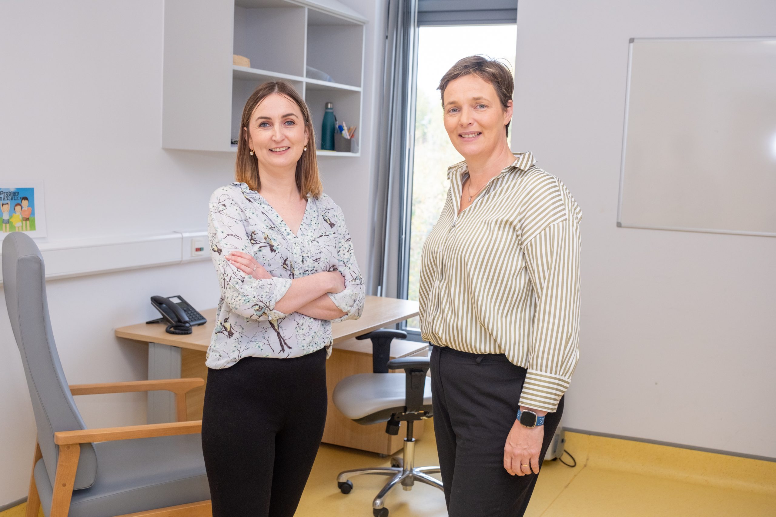 2 nurses smiling