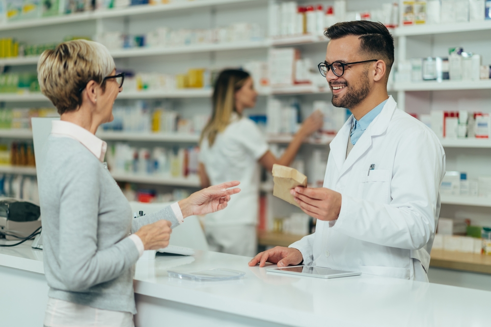 pharmacist with customer