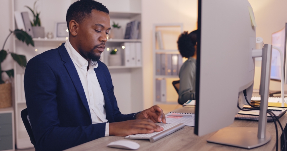 Clerical officer on computer