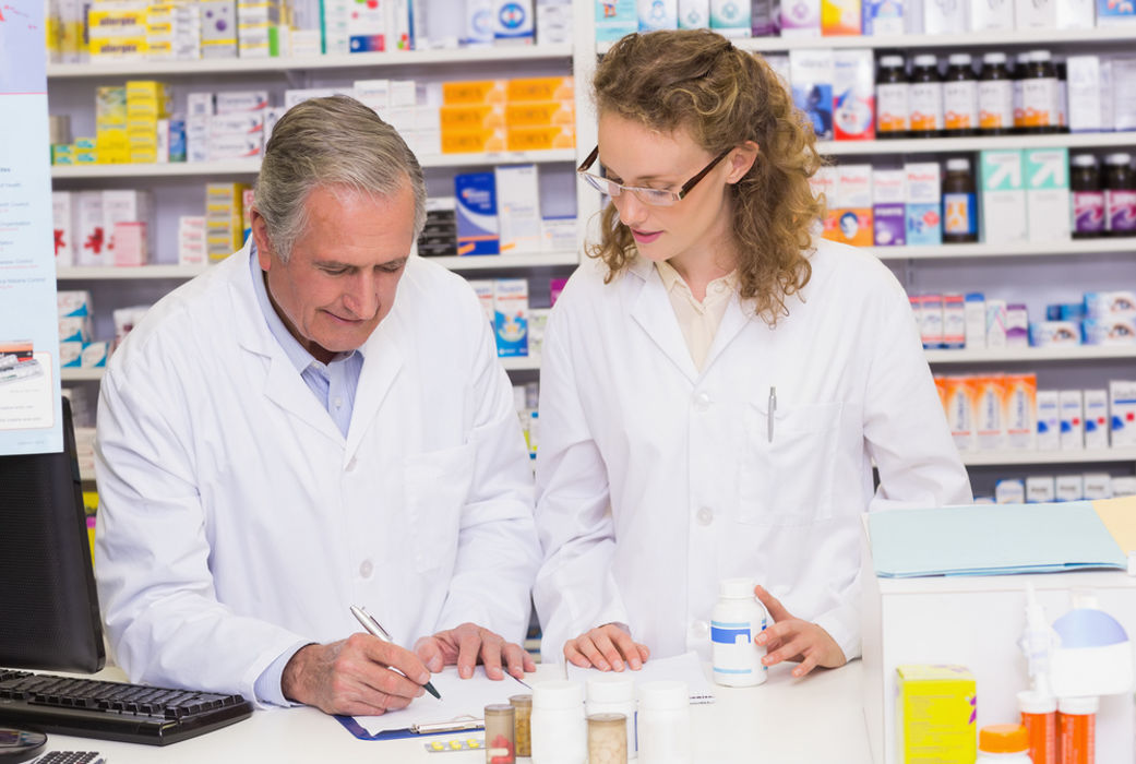 Elderly and young pharmacists
